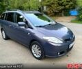 Серый Мазда 5, объемом двигателя 2 л и пробегом 185 тыс. км за 4650 $, фото 1 на Automoto.ua