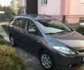 Серый Мазда 5, объемом двигателя 2 л и пробегом 165 тыс. км за 5600 $, фото 1 на Automoto.ua