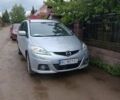Серый Мазда 5, объемом двигателя 2 л и пробегом 263 тыс. км за 5200 $, фото 1 на Automoto.ua