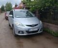 Серый Мазда 5, объемом двигателя 2 л и пробегом 263 тыс. км за 5200 $, фото 1 на Automoto.ua