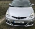 Серый Мазда 5, объемом двигателя 2 л и пробегом 213 тыс. км за 6000 $, фото 1 на Automoto.ua