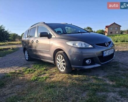 Серый Мазда 5, объемом двигателя 2 л и пробегом 247 тыс. км за 7200 $, фото 1 на Automoto.ua