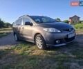 Серый Мазда 5, объемом двигателя 2 л и пробегом 247 тыс. км за 7200 $, фото 1 на Automoto.ua
