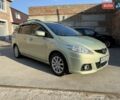 Серый Мазда 5, объемом двигателя 2 л и пробегом 237 тыс. км за 5400 $, фото 1 на Automoto.ua
