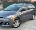 Серый Мазда 5, объемом двигателя 2 л и пробегом 227 тыс. км за 5190 $, фото 1 на Automoto.ua