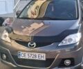 Серый Мазда 5, объемом двигателя 2 л и пробегом 270 тыс. км за 6850 $, фото 1 на Automoto.ua
