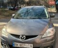 Серый Мазда 5, объемом двигателя 2 л и пробегом 292 тыс. км за 3800 $, фото 1 на Automoto.ua