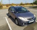 Серый Мазда 5, объемом двигателя 2 л и пробегом 206 тыс. км за 6000 $, фото 1 на Automoto.ua