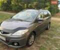 Серый Мазда 5, объемом двигателя 2 л и пробегом 285 тыс. км за 5350 $, фото 1 на Automoto.ua