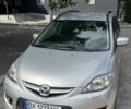 Серый Мазда 5, объемом двигателя 2 л и пробегом 180 тыс. км за 6991 $, фото 1 на Automoto.ua