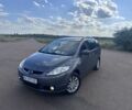 Серый Мазда 5, объемом двигателя 2 л и пробегом 253 тыс. км за 4659 $, фото 1 на Automoto.ua