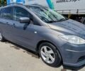 Серый Мазда 5, объемом двигателя 2 л и пробегом 245 тыс. км за 5930 $, фото 3 на Automoto.ua