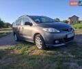 Серый Мазда 5, объемом двигателя 2 л и пробегом 247 тыс. км за 6800 $, фото 1 на Automoto.ua