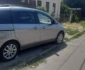 Серый Мазда 5, объемом двигателя 2 л и пробегом 217 тыс. км за 5700 $, фото 1 на Automoto.ua