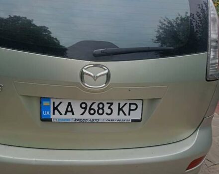 Серый Мазда 5, объемом двигателя 2 л и пробегом 234 тыс. км за 6400 $, фото 1 на Automoto.ua