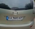 Серый Мазда 5, объемом двигателя 2 л и пробегом 234 тыс. км за 6400 $, фото 1 на Automoto.ua