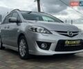 Серый Мазда 5, объемом двигателя 2 л и пробегом 179 тыс. км за 7700 $, фото 1 на Automoto.ua