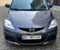Серый Мазда 5, объемом двигателя 2 л и пробегом 250 тыс. км за 7500 $, фото 1 на Automoto.ua