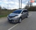 Серый Мазда 5, объемом двигателя 2 л и пробегом 224 тыс. км за 6850 $, фото 1 на Automoto.ua