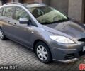 Серый Мазда 5, объемом двигателя 2 л и пробегом 250 тыс. км за 7500 $, фото 1 на Automoto.ua