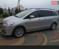 Серый Мазда 5, объемом двигателя 2 л и пробегом 283 тыс. км за 7700 $, фото 2 на Automoto.ua