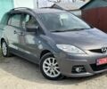 Серый Мазда 5, объемом двигателя 2 л и пробегом 228 тыс. км за 4999 $, фото 1 на Automoto.ua