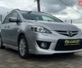 Серый Мазда 5, объемом двигателя 2 л и пробегом 179 тыс. км за 6800 $, фото 1 на Automoto.ua