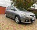 Серый Мазда 5, объемом двигателя 2 л и пробегом 252 тыс. км за 7200 $, фото 1 на Automoto.ua