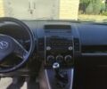 Серый Мазда 5, объемом двигателя 2 л и пробегом 282 тыс. км за 6100 $, фото 5 на Automoto.ua