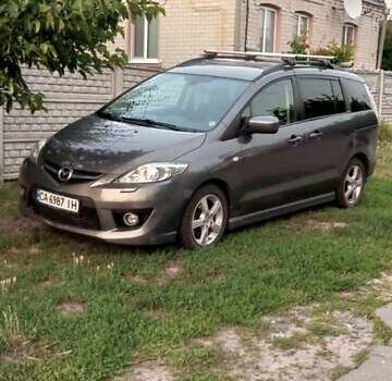 Серый Мазда 5, объемом двигателя 2 л и пробегом 222 тыс. км за 7850 $, фото 1 на Automoto.ua