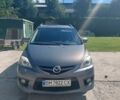 Серый Мазда 5, объемом двигателя 2 л и пробегом 234 тыс. км за 7800 $, фото 1 на Automoto.ua
