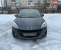 Серый Мазда 5, объемом двигателя 2 л и пробегом 189 тыс. км за 10050 $, фото 1 на Automoto.ua