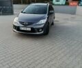 Серый Мазда 5, объемом двигателя 2 л и пробегом 255 тыс. км за 4999 $, фото 1 на Automoto.ua