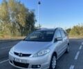 Серый Мазда 5, объемом двигателя 2 л и пробегом 299 тыс. км за 2999 $, фото 1 на Automoto.ua