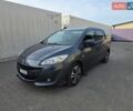 Серый Мазда 5, объемом двигателя 2 л и пробегом 285 тыс. км за 6350 $, фото 1 на Automoto.ua