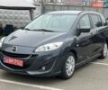 Серый Мазда 5, объемом двигателя 2 л и пробегом 258 тыс. км за 11000 $, фото 1 на Automoto.ua