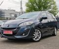 Серый Мазда 5, объемом двигателя 2 л и пробегом 128 тыс. км за 10699 $, фото 1 на Automoto.ua