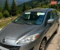 Серый Мазда 5, объемом двигателя 2.49 л и пробегом 170 тыс. км за 7800 $, фото 1 на Automoto.ua