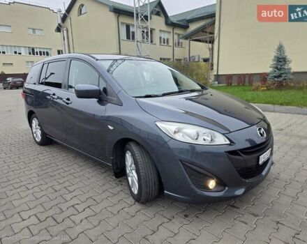 Серый Мазда 5, объемом двигателя 2 л и пробегом 280 тыс. км за 6650 $, фото 2 на Automoto.ua
