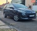 Серый Мазда 5, объемом двигателя 2.49 л и пробегом 176 тыс. км за 7500 $, фото 1 на Automoto.ua