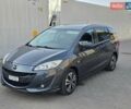 Серый Мазда 5, объемом двигателя 2 л и пробегом 285 тыс. км за 6350 $, фото 1 на Automoto.ua