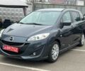 Серый Мазда 5, объемом двигателя 2 л и пробегом 258 тыс. км за 11000 $, фото 1 на Automoto.ua