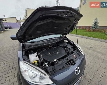 Серый Мазда 5, объемом двигателя 2 л и пробегом 280 тыс. км за 6650 $, фото 53 на Automoto.ua