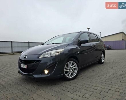Серый Мазда 5, объемом двигателя 2 л и пробегом 280 тыс. км за 6650 $, фото 1 на Automoto.ua