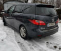 Серый Мазда 5, объемом двигателя 2 л и пробегом 230 тыс. км за 8000 $, фото 1 на Automoto.ua