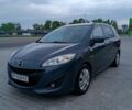 Серый Мазда 5, объемом двигателя 2 л и пробегом 210 тыс. км за 7800 $, фото 1 на Automoto.ua