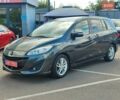 Серый Мазда 5, объемом двигателя 2 л и пробегом 196 тыс. км за 11000 $, фото 1 на Automoto.ua