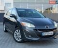 Серый Мазда 5, объемом двигателя 2.49 л и пробегом 208 тыс. км за 8300 $, фото 1 на Automoto.ua
