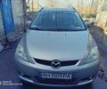 Серый Мазда 5, объемом двигателя 1.8 л и пробегом 280 тыс. км за 4167 $, фото 1 на Automoto.ua