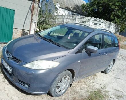 Серый Мазда 5, объемом двигателя 2 л и пробегом 200 тыс. км за 4700 $, фото 1 на Automoto.ua